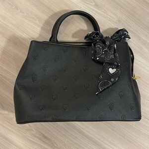 Betsy Johnson skull print purse